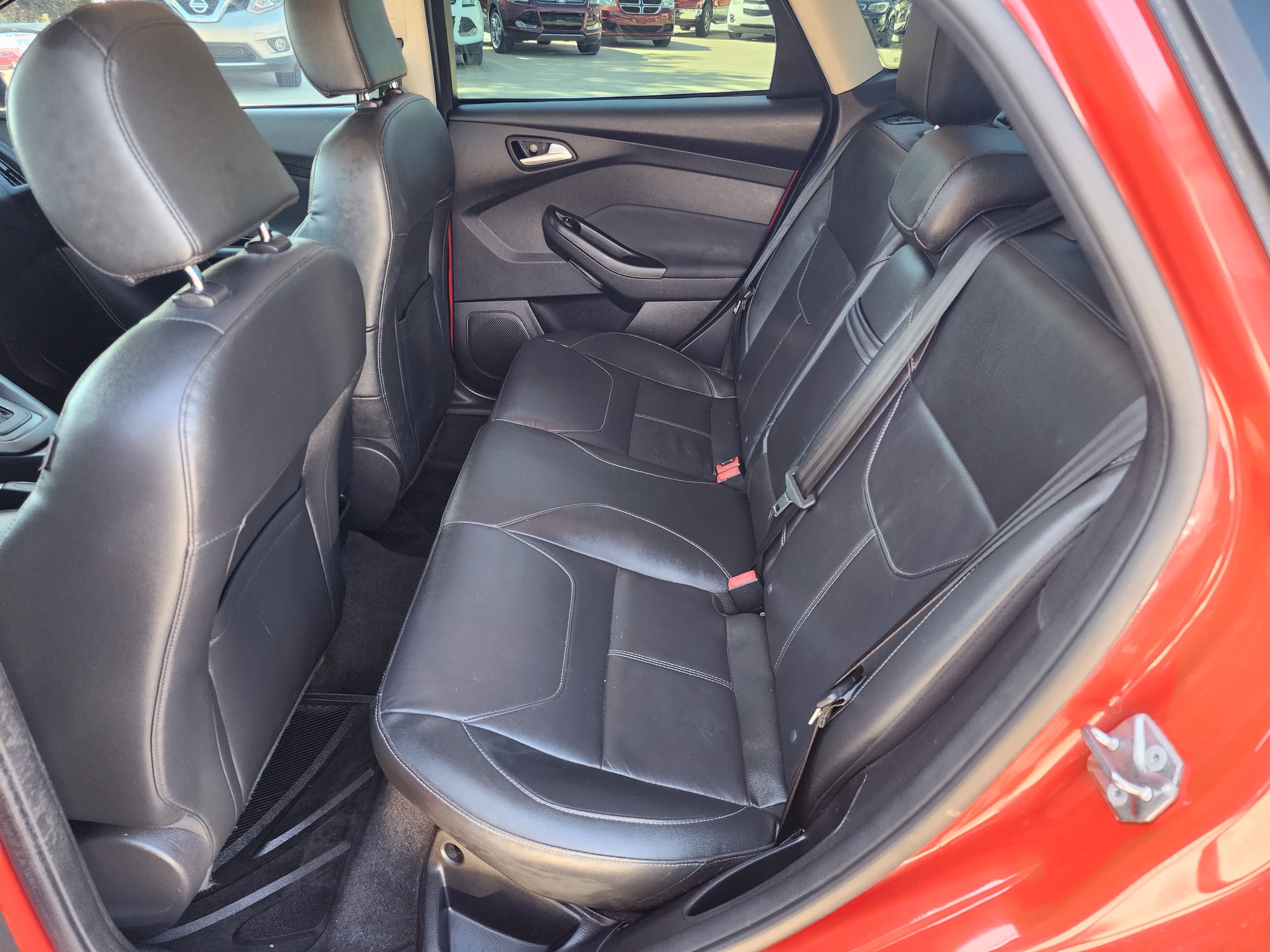 2015 RED Ford Focus SE (1FADP3F22FL) , AUTO transmission, located at 2660 S.Garland Avenue, Garland, TX, 75041, (469) 298-3118, 32.885387, -96.656776 - Welcome to DallasAutos4Less, one of the Premier BUY HERE PAY HERE Dealers in the North Dallas Area. We specialize in financing to people with NO CREDIT or BAD CREDIT. We need proof of income, proof of residence, and a ID. Come buy your new car from us today!! This is a Super Clean 2015 FORD FOCUS - Photo #14